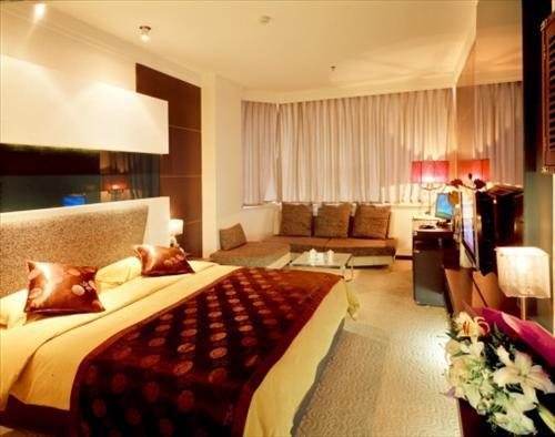 Dalian San Jiang Business Hotel Zimmer foto